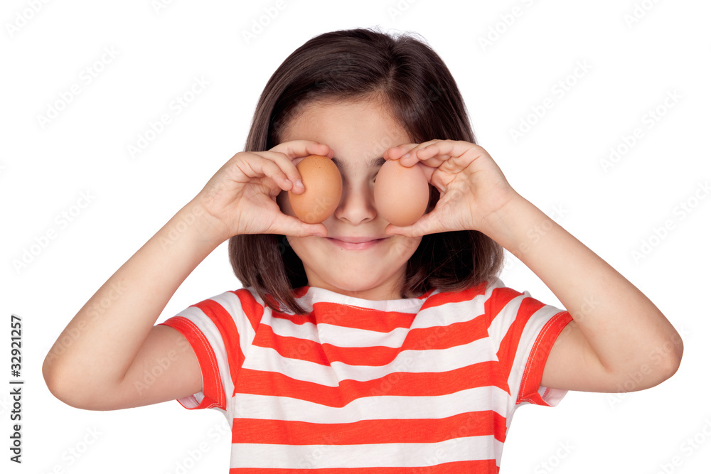 Wall mural brunette little girl with two eggs