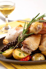 Roasted chicken drumsticks and potatoes