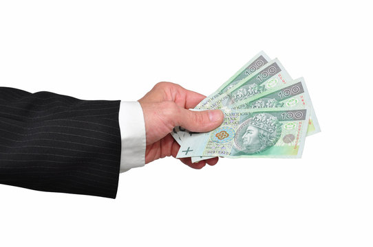 Banknoty podawane ręką