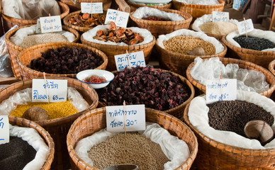 Spices and herbs in bamboo basket