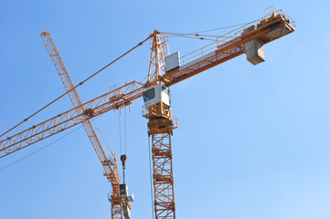 Tall yellow tower crane
