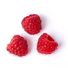 Drei reife Himbeeren