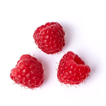 Drei reife Himbeeren