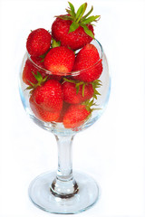 The clean glass with red fresh strawberry