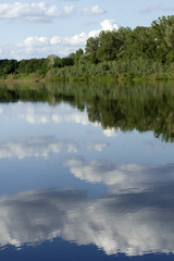 Fototapeta na wymiar River water sky reflection