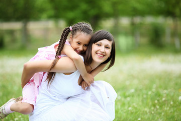 Naklejka premium Young mother and her young daughter