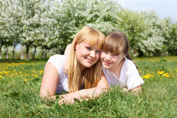 girl with mother in spring park