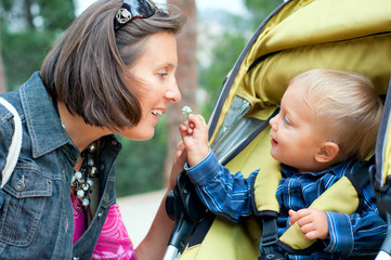 Boy with mother in the park