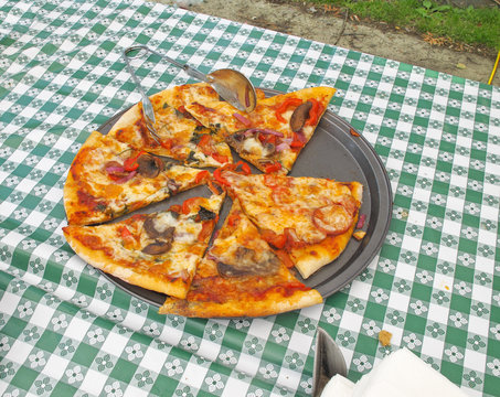 Organic pizza at outdoor market - Powered by Adobe