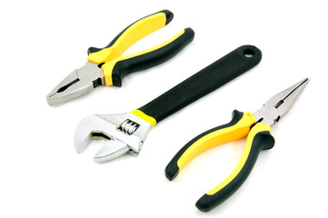 Obraz premium Adjustable wrench, long & Flat nose pliers isolated on white background