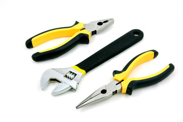 Obraz premium Adjustable wrench, long & Flat nose pliers isolated on white background