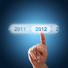 Finger wählt per Touchscreen 2012 aus - obrazy, fototapety, plakaty