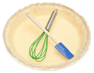 Uncooked Pie Crust with Kitchen Tools