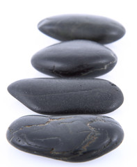 Spa stones on a white background