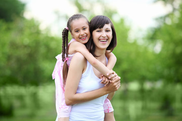 Young mother and her young daughter