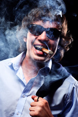 Closeup portrait of a man with cigar