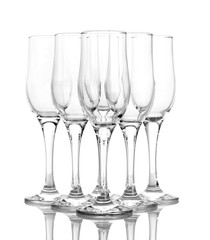 Few empty wine glasses on blue background