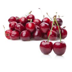 Fresh cherries isolated on white.
