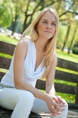 Pensive mood - woman on bench