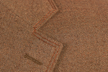 brown elegant buttonhole suit
