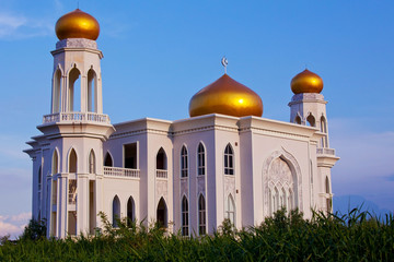 Fototapeta na wymiar View of islamic mosque on sunset