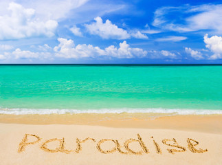 Word Paradise on beach