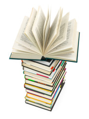 Opened book on stack