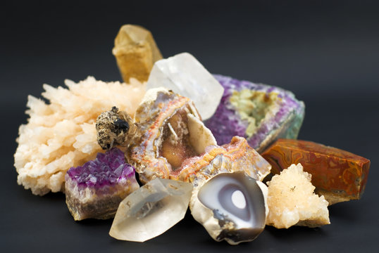 composition of natural gem stones on a black background