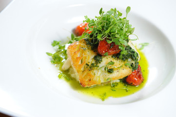 Fish steak with vegetables