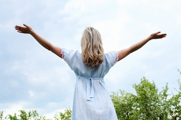 Young blond woman in the park