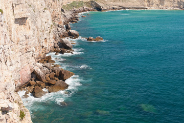 Rocky hills bathing in the ocean