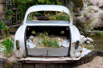 Garden installation with the vintage car