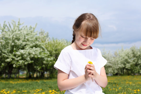 little girl in spring park