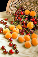 ripe fruit and berry in the basket isolated on white