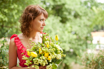 Young woman with beautiful bouquet