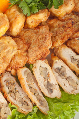 Appetizer of meat with lettuce, pepper and vegetables