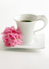 Obraz na płótnie Canvas coffee and pink flower