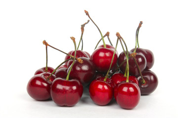 Obraz na płótnie Canvas Red cherries isolated on a white background