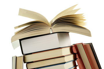 Composition with stack of books on white background