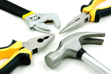 Tool kit of hammer, adjustable wrench and pliers