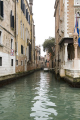 Fototapeta na wymiar Old Rainy Venice Street and Channels