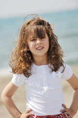 little female  child portrait on the beach