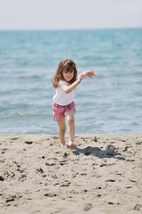 little female  child portrait on the beach