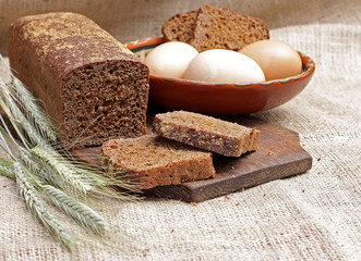 Bread rye cut with slices and eggs