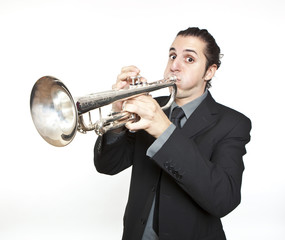 stylish jazz man playing the trumpet on white background