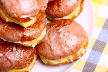 Delicious dessert made of several glazed donuts