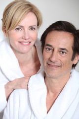 Couple wearing bath robes