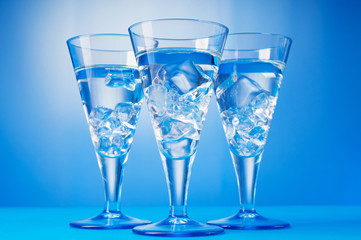 Water in the glass against gradient background