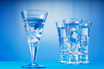 Water in the glass against gradient background