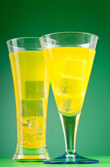 Colourful cocktail in glasses with ice